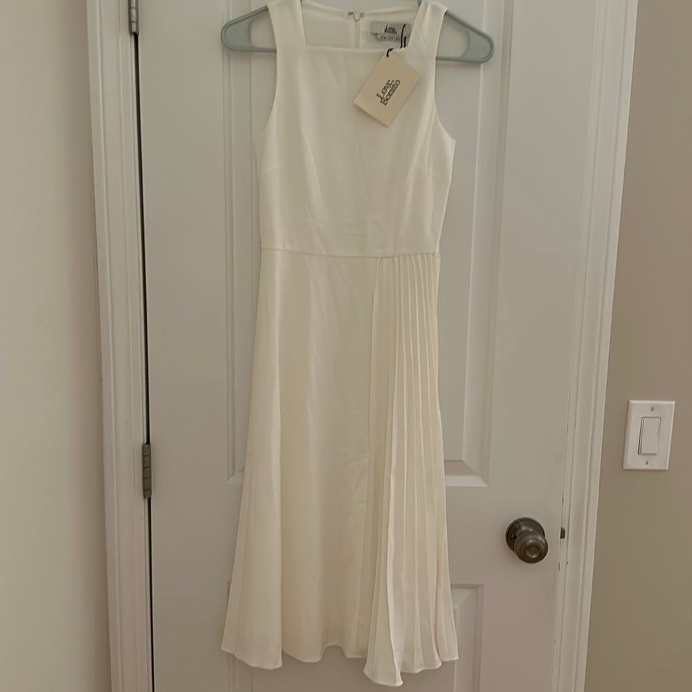 Never worn Love Bonito square line white dress with pleat details